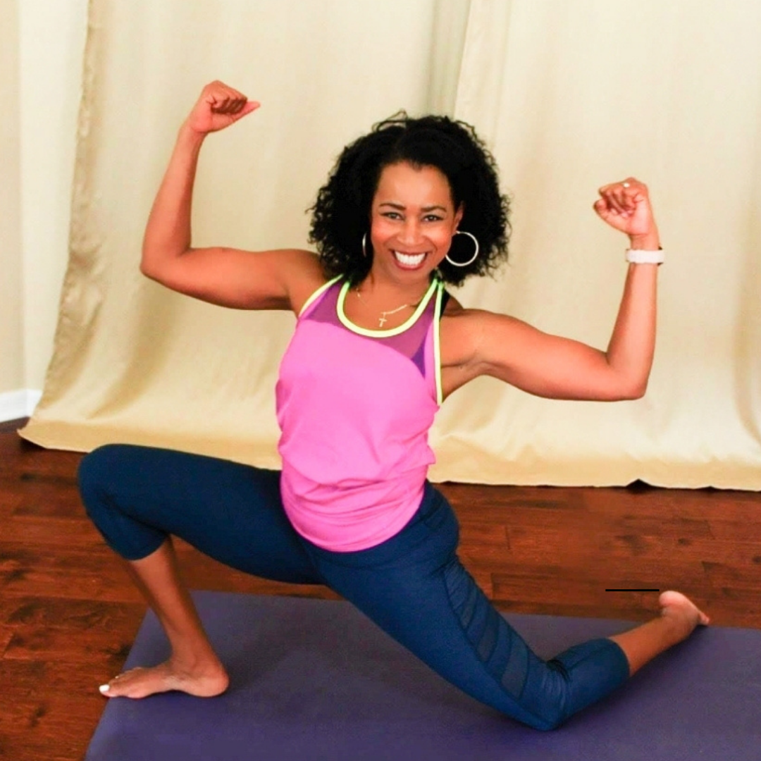Shannon Thigpen, Tampa-based SHINE Yoga instructor and fitness coach displaying strong kneeling lunge pose